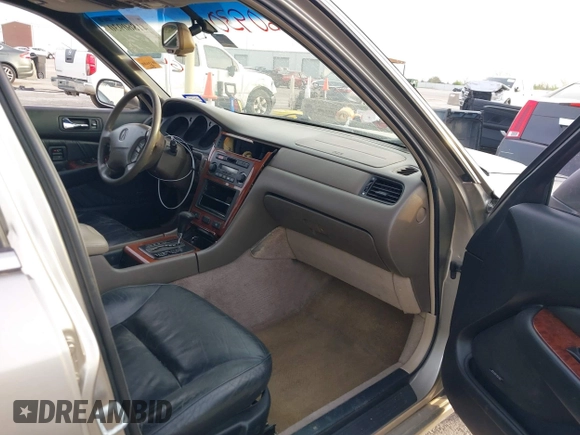 2002 Acura RL with VIN JH4KA96552C008589, listed as a IAAI auction lot 41860930 with 210,847 mi miles and . Bid and sale history available at DreamBid. Image 5.