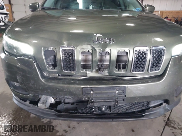 2021 Jeep Cherokee Latitude Lux with VIN 1C4PJLMXXMD154928, listed as a IAAI auction lot 41186627 with 31,577 mi miles. Bid and sale history available at carsss.com. Image 6.