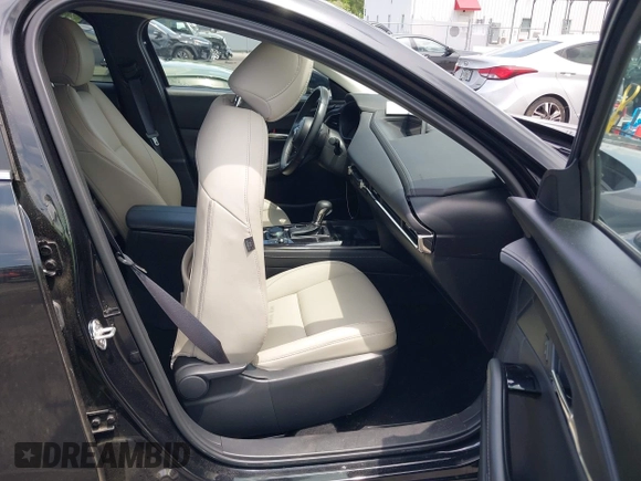 2023 Mazda CX-30 S Carbon Edition с VIN 3MVDMBCM7PM549197, выставлен на аукционе IAAI как лот 42224977 с пробегом 22 201 миль миль и . История ставок и продаж доступна на DreamBid. Изображение 5.