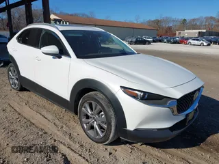 2024 Mazda CX-30 2.5 S Premium Package with VIN 3MVDMBDM0RM657503, listed as a IAAI auction lot 40884995 with 6,067 mi miles. Bid and sale history available at carsss.com. Image 1.