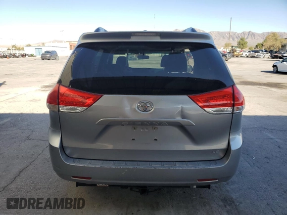 2012 Toyota Sienna LE AAS with VIN 5TDKK3DC8CS259085, listed as a Copart auction lot 73592584 with 198,370 mi miles and Salvage Title. Bid and sale history available at DreamBid. Image 6.