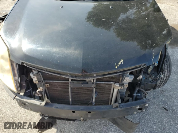2015 Cadillac SRX Performance Collection with VIN 3GYFNCE32FS558430, listed as a Copart auction lot 63633865 with 153,729 mi miles and Salvage title. Bid and sale history available at DreamBid. Image 12.