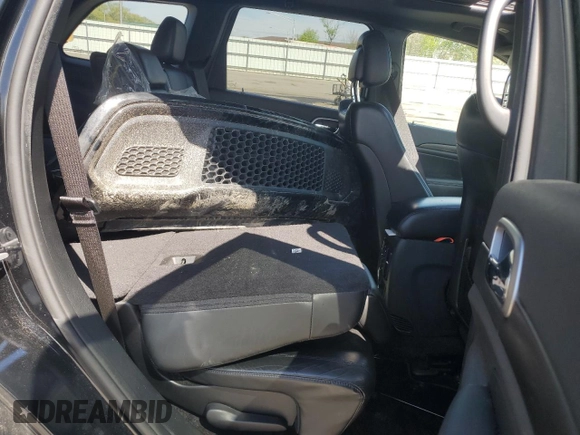 2017 Jeep Grand Cherokee Altitude z VIN 1C4RJFAGXHC828795, wystawiony jako Copart lot #53865265 z przebiegiem 65 152 mil mil oraz Szkoda całkowita • Salvage title. Historia ofert i sprzedaży dostępna na DreamBid. Obrazek 11.