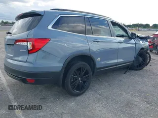 2022 Honda Pilot Special Edition with VIN 5FNYF5H20NB023811, listed as a IAAI auction lot 40612518 with Not Provided miles and . Bid and sale history available at carsss.com. Image 4.