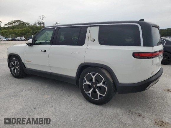 2023 Rivian R1S Adventure z VIN 7PDSGABA3PN024458, wystawiony jako Copart lot #74087714 z przebiegiem 3 505 mil mil oraz Nie do naprawy • Non repairable. Historia ofert i sprzedaży dostępna na DreamBid. Obrazek 2.