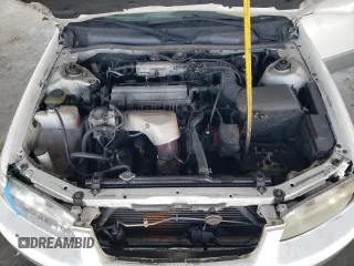 2001 Toyota Camry CE z VIN JT2BG22K010543907, wystawiony jako Copart lot #60874815 z przebiegiem 313 008 mil mil oraz Czysty tytuł • Clean title. Historia ofert i sprzedaży dostępna na DreamBid. Obrazek 11.