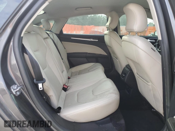 2017 Ford Fusion Titanium z VIN 3FA6P0SU0HR290201, wystawiony jako Copart lot #60106095 z przebiegiem 98 086 mil mil oraz Szkoda całkowita • Salvage title. Historia ofert i sprzedaży dostępna na DreamBid. Obrazek 10.