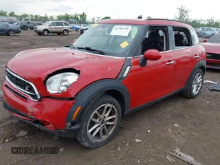 2015 MINI Countryman S with VIN WMWZC3C56FWP53249, listed as a IAAI auction lot 42256130 with 104,415 mi miles and . Bid and sale history available at DreamBid. Image 18.
