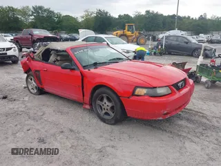 2003 Ford Mustang Deluxe z VIN 1FAFP44433F314534, wystawiony jako IAAI lot #42368748 z przebiegiem 171 980 mil mil oraz . Historia ofert i sprzedaży dostępna na DreamBid. Obrazek 1.
