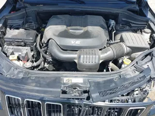 2015 Jeep Grand Cherokee Limited with VIN 1C4RJFBG4FC191141, listed as a IAAI auction lot 42075659 with 135,641 mi miles. Bid and sale history available at carsss.com. Image 10.