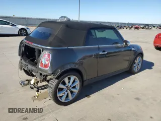 2014 MINI Convertible S with VIN WMWZP3C58ET706941, listed as a Copart auction lot 81900674 with 61,292 mi miles and Salvage title. Bid and sale history available at DreamBid. Image 3.