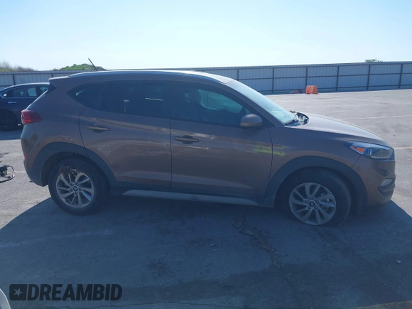 2017 Hyundai Tucson SE z VIN KM8J33A47HU485803, wystawiony jako IAAI lot #42269337 z przebiegiem 96 541 mil mil oraz . Historia ofert i sprzedaży dostępna na DreamBid. Obrazek 13.
