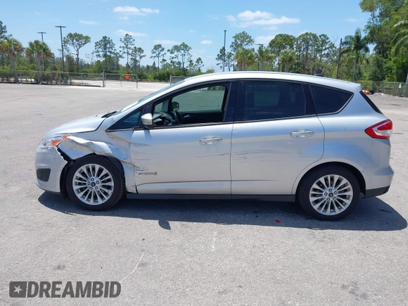 2018 Ford C-Max SE z VIN 1FADP5AU1JL104191, wystawiony jako IAAI lot #42153994 z przebiegiem 132 413 mil mil oraz . Historia ofert i sprzedaży dostępna na DreamBid. Obrazek 14.