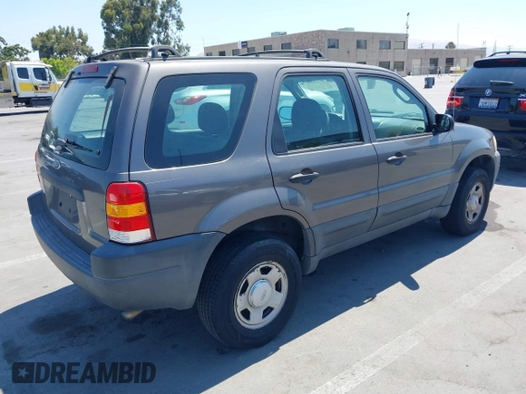 2004 Ford Escape XLS with VIN 1FMYU92194KA15054, listed as a IAAI auction lot 42772942 with 157,270 mi miles and . Bid and sale history available at DreamBid. Image 4.