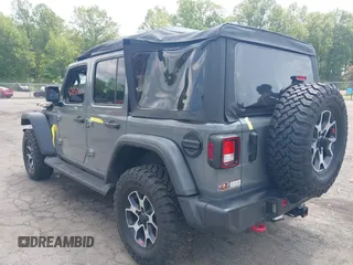 2021 Jeep Wrangler Unlimited Rubicon with VIN 1C4HJXFN3MW816375, listed as a IAAI auction lot 42480514 with 62,324 mi miles and . Bid and sale history available at DreamBid. Image 3.