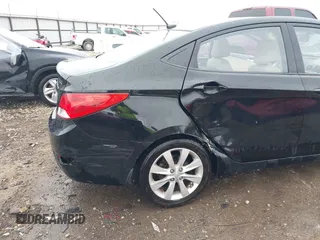 2013 Hyundai Accent GLS with VIN KMHCU4AE9DU379870, listed as a IAAI auction lot 41534029 with 102,610 mi miles. Bid and sale history available at carsss.com. Image 6.