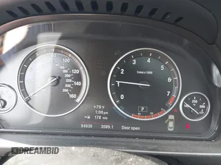 2013 BMW 5 Series 528i with VIN WBAXG5C51DDY33333, listed as a IAAI auction lot 41685179 with 94,936 mi miles and . Bid and sale history available at carsss.com. Image 7.