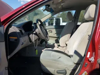 2009 Kia Spectra EX with VIN KNAFE221595630820, listed as a Copart auction lot 72431004 with 136,469 mi miles and Salvage Title. Bid and sale history available at carsss.com. Image 7.