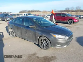 2016 Ford Focus SE with VIN 1FADP3F27GL374188, listed as a IAAI auction lot 41738121 with 125,229 mi miles. Bid and sale history available at carsss.com. Image 1.