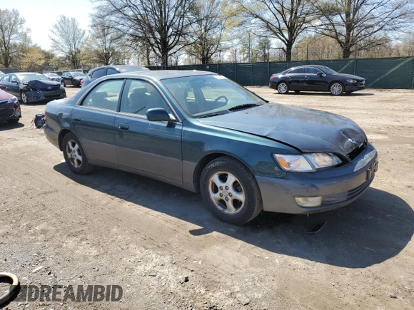 1997 Lexus ES 300 Luxury Sport Sdn with VIN JT8BF22G9V0050351, listed as a Copart auction lot 52082575 with 201,831 mi miles and Salvage Title. Bid and sale history available at carsss.com. Image 4.