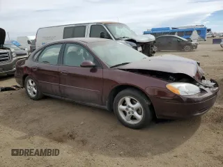 2001 Ford Taurus SES with VIN 1FAFP55S61G184193, listed as a Copart auction lot 49190475 with 129,415 mi miles and Salvage Title. Bid and sale history available at DreamBid. Image 4.