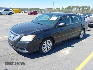 2010 Toyota Avalon XL with VIN 4T1BK3DBXAU361354, listed as a IAAI auction lot 41863124 with 163,625 mi miles and . Bid and sale history available at DreamBid. Image 2.