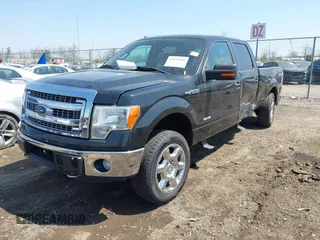 2014 Ford F-150 XL with VIN 1FTFW1ETXEFB51711, listed as a IAAI auction lot 42075381 with 238,603 mi miles. Bid and sale history available at carsss.com. Image 17.