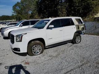 2020 GMC Yukon SLT with VIN 1GKS1BKC2LR248912, listed as a Copart auction lot 79935584 with 100,313 mi miles and Salvage Title. Bid and sale history available at carsss.com. Image 1.