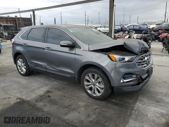 2021 Ford Edge Titanium with VIN 2FMPK4K96MBA16599, listed as a Copart auction lot 53920735 with 71,376 mi miles and Salvage title. Bid and sale history available at DreamBid. Image 4.
