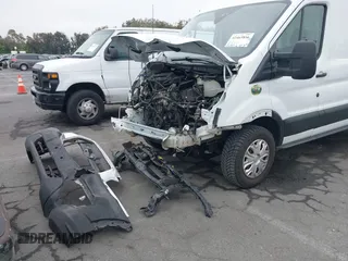 2023 Ford Transit Cargo with VIN 1FTBR1C86PKA02758, listed as a IAAI auction lot 42465866 with 33,095 mi miles and . Bid and sale history available at DreamBid. Image 6.