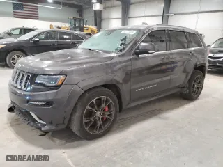 2015 Jeep Grand Cherokee SRT with VIN 1C4RJFDJ8FC752210, listed as a Copart auction lot 88773005 with 76,721 mi miles and Salvage Title. Bid and sale history available at carsss.com. Image 1.