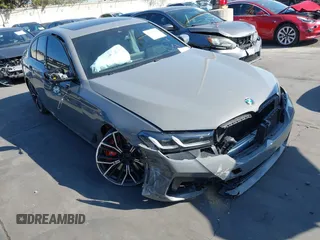 2022 BMW 5 Series M550i xDrive with VIN WBA13BK02NCJ61943, listed as a IAAI auction lot 41607980 with Not provided miles and . Bid and sale history available at DreamBid. Image 1.