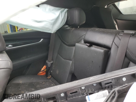 2021 Cadillac XT5 FWD Premium Luxury z VIN 1GYKNCR41MZ154357, wystawiony jako Copart lot #86819564 z przebiegiem Nie podano mil oraz Nie do naprawy • Non repairable. Historia ofert i sprzedaży dostępna na DreamBid. Obrazek 10.