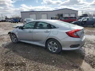 2017 Honda Civic Sedan LX with VIN 19XFC2F51HE218631, listed as a Copart auction lot 52105775 with 82,214 mi miles and Salvage Title. Bid and sale history available at carsss.com. Image 2.