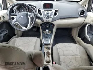 2013 Ford Fiesta SE z VIN 3FADP4EJ8DM146676, wystawiony jako Copart lot #55565485 z przebiegiem 168 801 mil mil oraz Szkoda całkowita • Salvage title. Historia ofert i sprzedaży dostępna na DreamBid. Obrazek 8.