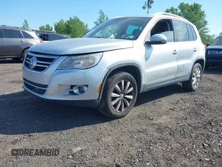 2011 Volkswagen Tiguan SE with VIN WVGBV7AX4BW528845, listed as a IAAI auction lot 42248245 with 224,808 mi miles and . Bid and sale history available at DreamBid. Image 2.