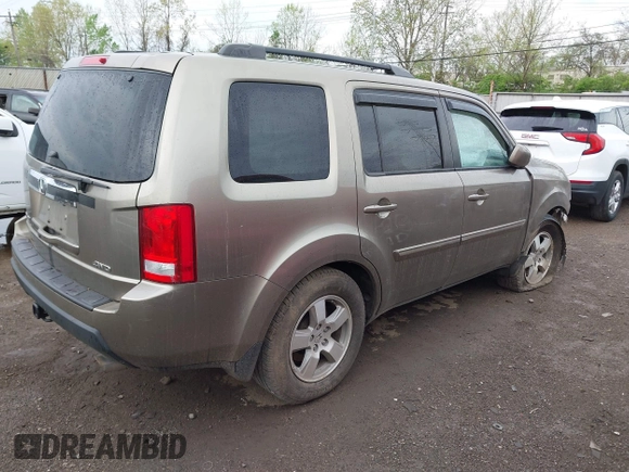 2011 Honda Pilot EX-L with VIN 5FNYF4H51BB076050, listed as a IAAI auction lot 42122883 with 143,288 mi miles and . Bid and sale history available at carsss.com. Image 4.