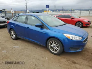 2018 Ford Focus SE with VIN 1FADP3FE4JL287169, listed as a Copart auction lot 53181935 with 134,656 mi miles and Clean Title. Bid and sale history available at carsss.com. Image 4.