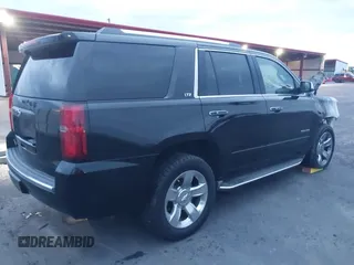 2015 Chevrolet Tahoe LTZ z VIN 1GNSKCKC5FR213209, wystawiony jako IAAI lot #41023368 z przebiegiem Nie podano mil oraz . Historia ofert i sprzedaży dostępna na DreamBid. Obrazek 4.