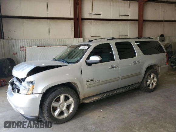 2014 Chevrolet Suburban LT with VIN 1GNSCJE07ER140989, listed as a Copart auction lot 44506315 with 162,490 mi miles and Salvage Title. Bid and sale history available at carsss.com. Image 1.