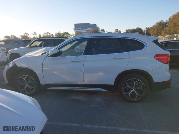 2019 BMW X1 sDrive28i with VIN WBXHU7C54K3H45462, listed as a IAAI auction lot 41209117 with 52,719 mi miles. Bid and sale history available at carsss.com. Image 14.