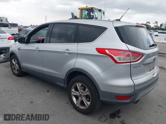 2015 Ford Escape SE with VIN 1FMCU0G95FUC81490, listed as a IAAI auction lot 42136791 with 140,967 mi miles. Bid and sale history available at carsss.com. Image 3.