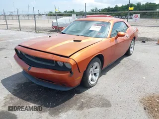2011 Dodge Challenger z VIN 2B3CJ4DG7BH581585, wystawiony jako IAAI lot #42358543 z przebiegiem 247 380 mil mil oraz . Historia ofert i sprzedaży dostępna na DreamBid. Obrazek 2.