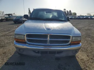 2001 Dodge Dakota Sport z VIN 1B7GL2AN81S120632, wystawiony jako Copart lot #50730415 z przebiegiem 191 302 mil mil oraz Czysty tytuł • Clean title. Historia ofert i sprzedaży dostępna na DreamBid. Obrazek 5.