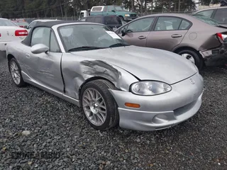 2002 Mazda MX-5 Miata Cloth z VIN JM1NB353620221304, wystawiony jako IAAI lot #41178747 z przebiegiem 98 958 mil mil oraz . Historia ofert i sprzedaży dostępna na DreamBid. Obrazek 1.
