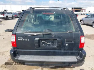 2001 Isuzu Rodeo S with VIN 4S2CK58W114363340, listed as a IAAI auction lot 41498698 with 185,408 mi miles and . Bid and sale history available at DreamBid. Image 16.