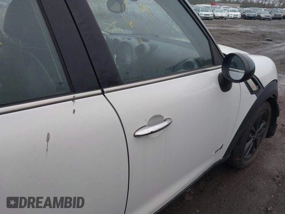 2012 MINI Countryman S with VIN WMWZC5C56CWL56311, listed as a IAAI auction lot 41825109 with Not Provided miles and . Bid and sale history available at DreamBid. Image 6.