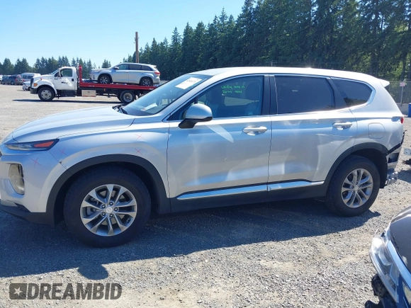 2019 Hyundai Santa Fe SE with VIN 5NMS2CAD9KH122140, listed as a IAAI auction lot 42616171 with 50,794 mi miles and . Bid and sale history available at DreamBid. Image 15.