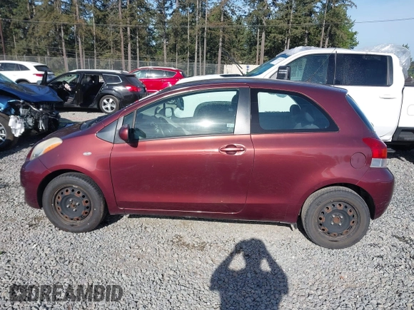 2009 Toyota Yaris with VIN JTDJT903295239611, listed as a IAAI auction lot 42216768 with 122,512 mi miles and . Bid and sale history available at DreamBid. Image 14.