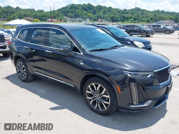 2020 Cadillac XT6 FWD Premium Luxury with VIN 1GYKPCRS0LZ220243, listed as a IAAI auction lot 42567404 with 45,643 mi miles and . Bid and sale history available at DreamBid. Image 1.